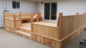 Large light wooden deck with built-in bench & steps