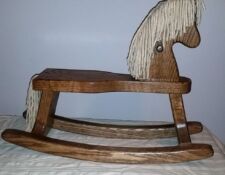 Custom-made wooden children’s rocking horse