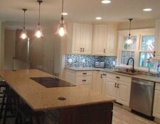 Bright new kitchen remodel with large granite island