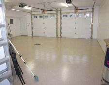 Clean, bright interior of a 2-stall white garage